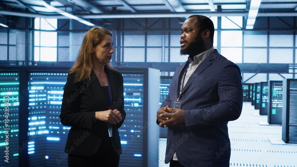 Poster african american expert and coworker looking at holograms in data center, working together. team mem