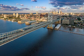 Benjamin Franklin Bridge crossing the Delaware River looking towards downtown Philadelphia,...
