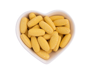 pills in ceramic bowl isolated