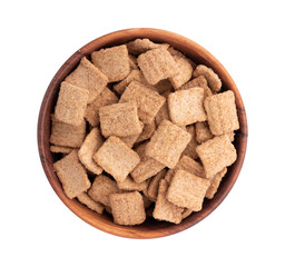 wooden bowl of crunchy granola, cinnamon toast crunch isolated on white background with clipping path, heap of flakes with cinnamon
