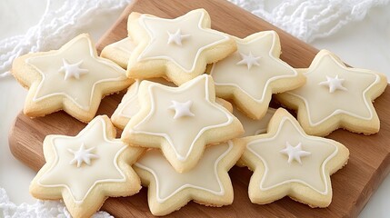Delicate linzer cookies in various shapes and jam fillings are beautifully arranged on a rustic wooden board with festive decorations