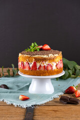 Strawberry Cake in Rustic Style. Vertical photo
