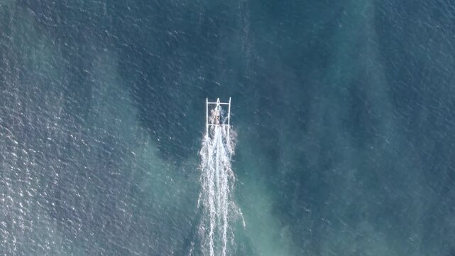 Indonesia, Bali, fishing boat returns from fishing in the morning, Amed, Karangasem, Bali, Indonesia