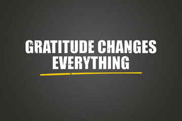 Gratitude Changes Everything. A blackboard with white text. Illustration with grunge text style.