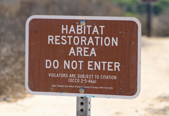 Fototapeta premium Habitat Restoration sign at park