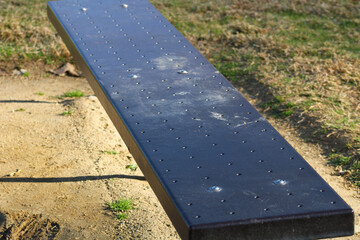 black wooden bench at park
