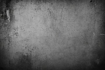 Fototapeta premium Dark gray grungy textured background for design overlays.