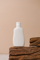 Cosmetic bottle mockup, with cream background, mockup for your product branding