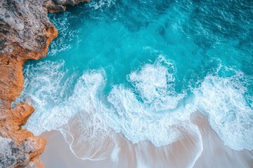 Aerial View of Ocean Waves Crashing on Sandy Beach