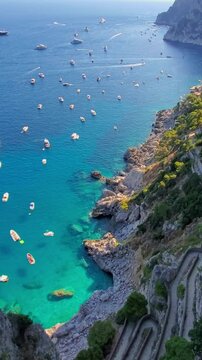Italy, scenic views of Capri Island and faraglioni from Augustus Gardens.