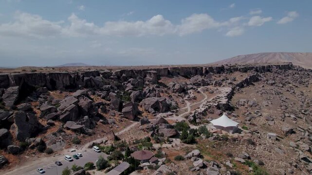 Stunning aerial drone footage of The Gobustan Rock Formations, the Gobustan National Park, UNESCO World Heritage Site, Azerbaijan, Central Asia, Asia
