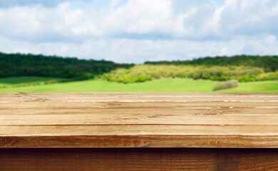 Wooden empty table top on nature background