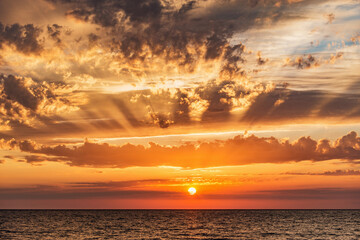 Amazing sunset sky above the sea.