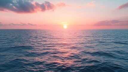 Obraz premium Serene Sunset Over Calm Ocean Waves