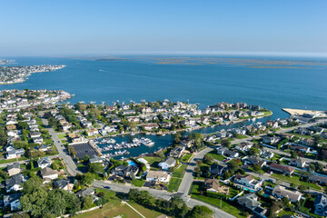 Aerial view of south shore of Long Island coast water boats canal on a sunny day.