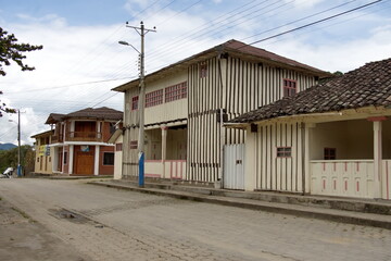 Striped building on the corner, in the village of Cuellaje, Ecuador