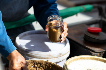 Put sesame paste into the bottle