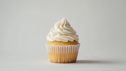 Vanilla Cupcake with White Frosting on White Background