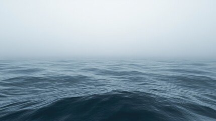 Fototapeta premium Calm Ocean Wave Landscape Under Foggy Sky