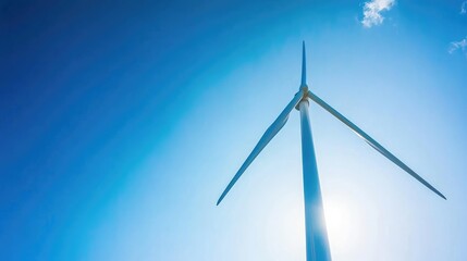 Fototapeta premium Perspective View of a Wind Turbine Under Clear Sky