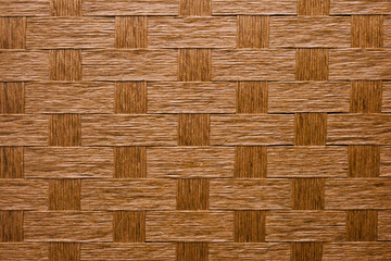 編み込んだ木製の網細工　テクスチャー背景壁紙　かご・織物・自然素材の表面