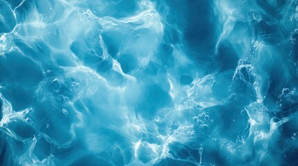 A vibrant blue water surface with swirling patterns and bubbles.