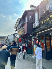 Obraz premium People Walking at Busy Street Market at Suzhou China