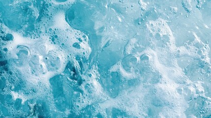 Obraz premium Close-up of bubbling turquoise water creating a textured surface.