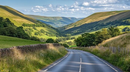 Serene Rural Road Through Green Valley Landscape