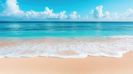 Obraz premium Serene Tropical Beach with Clear Blue Water and Clouds