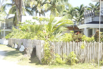 white fence and cottage