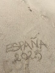 Title on the sand &bdquo;Spain 2025&ldquo;