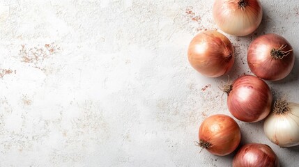 Obraz premium Fresh Ripe Onion on White Textured Background - Ideal for Food Design Projects