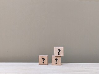 wooden cube with the question mark on it. curiosity,  riddle and Inquiry, 