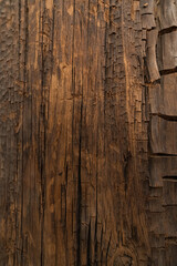 Vertical photo background, texture of old cracked oak wood.