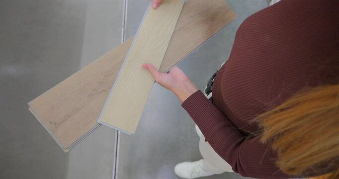 Designer Choosing Flooring Materials for Interior Design