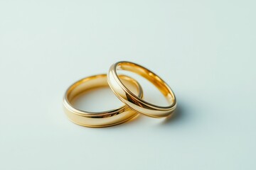 Elegant Gold Wedding Rings on Soft Background