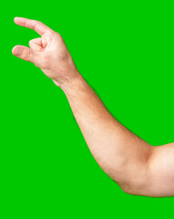 human arm gesturing with raised fingers against a bright green backdrop