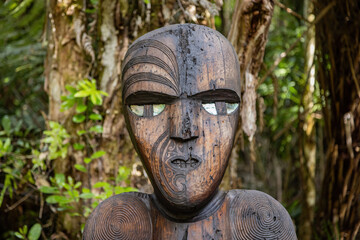 Maori Carving on the Kauri Cascades trail in the Waitakere Ranges, New Zealand. 6 October 2024