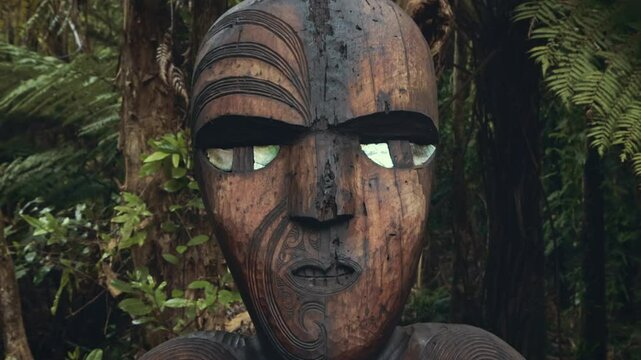 Maori Carving on the Kauri Cascades trail in the Waitakere Ranges, New Zealand. 6 October 2024