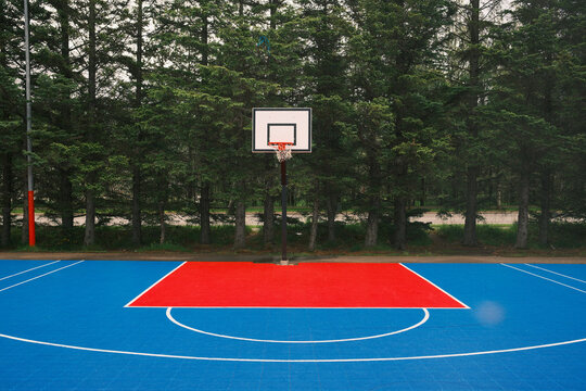 Basketball court with red and blue flooring