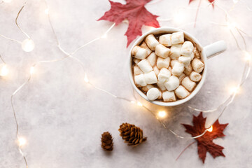 Cup of hot chocolate on white background