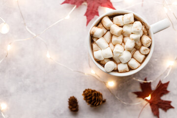 Cup of hot chocolate on white background