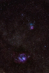 Milky way Lagoon and Trifid nebulae photographed through a long focal telescope.