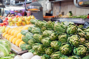 Artichokes at a stall at local food market of Valencia