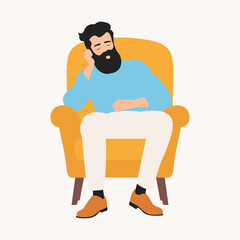 Bearded man sleeping in a cozy armchair