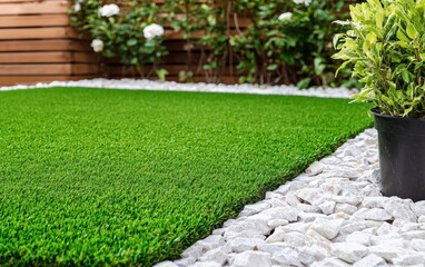 Obraz premium Modern house exterior with a perfectly manicured artificial grass lawn, stone garden beds, and sleek wood paneling, highlighting suburban luxury