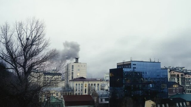 War in Ukraine. Smoke after explosion and military attack