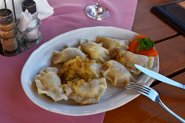 Pierogi on a plate in a restaurant