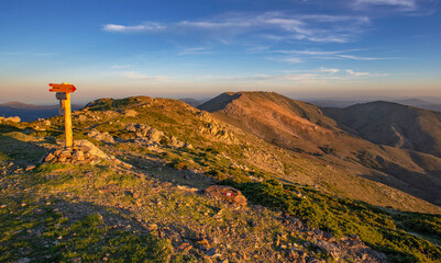 beautiful scenic view on summit mountain in Sardinia at sunset with a sign to punto la Marmora